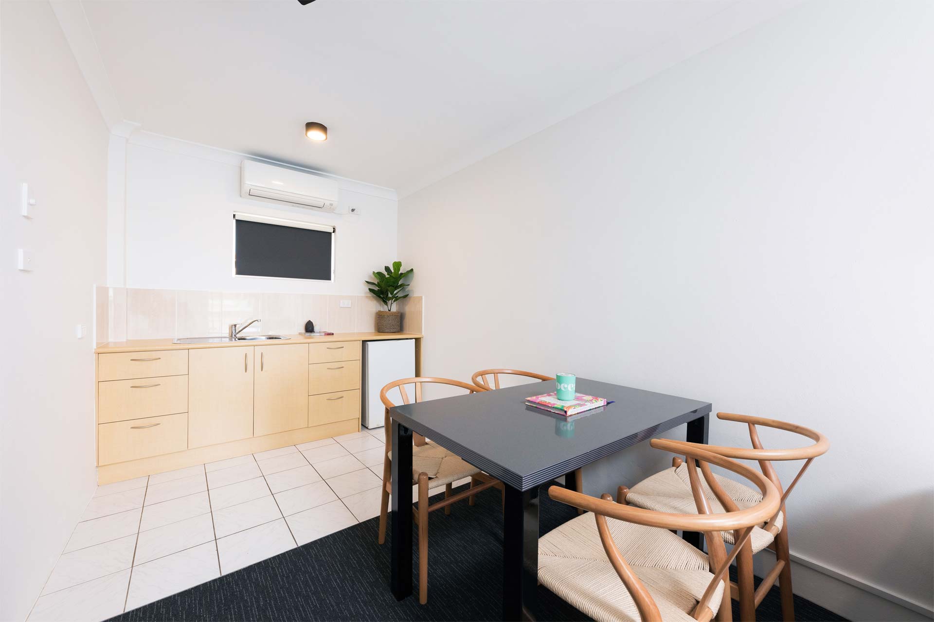 13. Hotel Forster Family Room - Kitchen and dining area