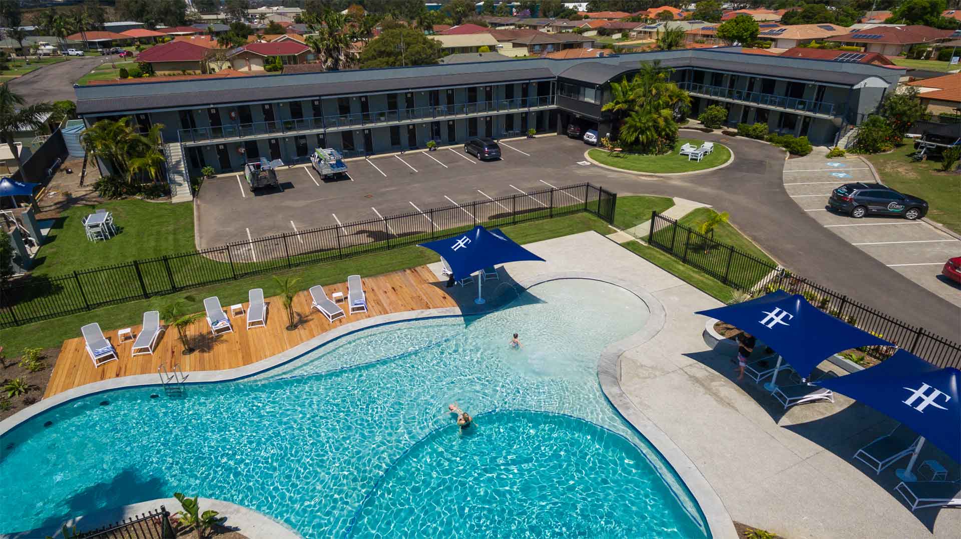 19. Aerial image of Hotel Forster including pool, water slide and tennis court